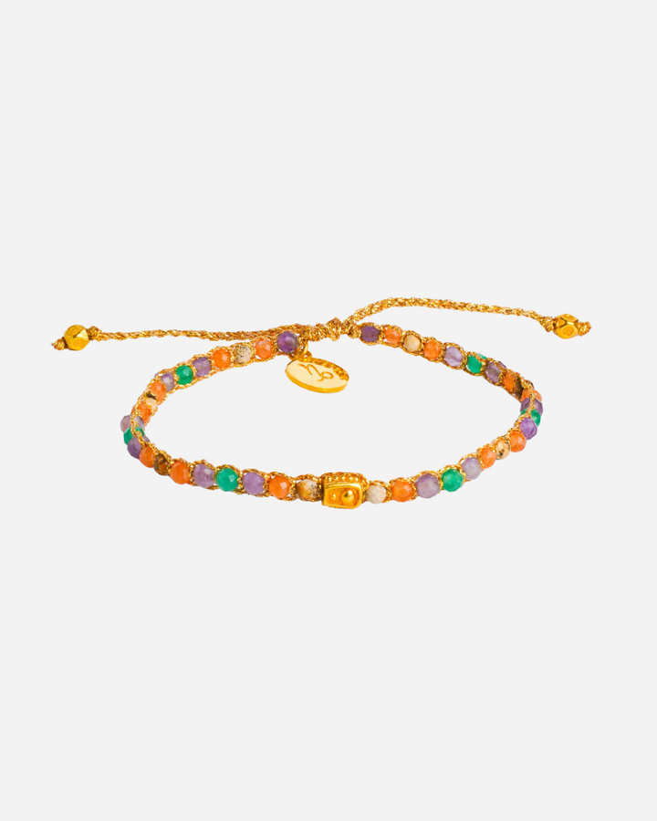 Capricorn Crystal Zodiac Gemstone Bracelet with orange, green, purple and brown gemstones woven in pure silver yarn and plated with 18k gold.