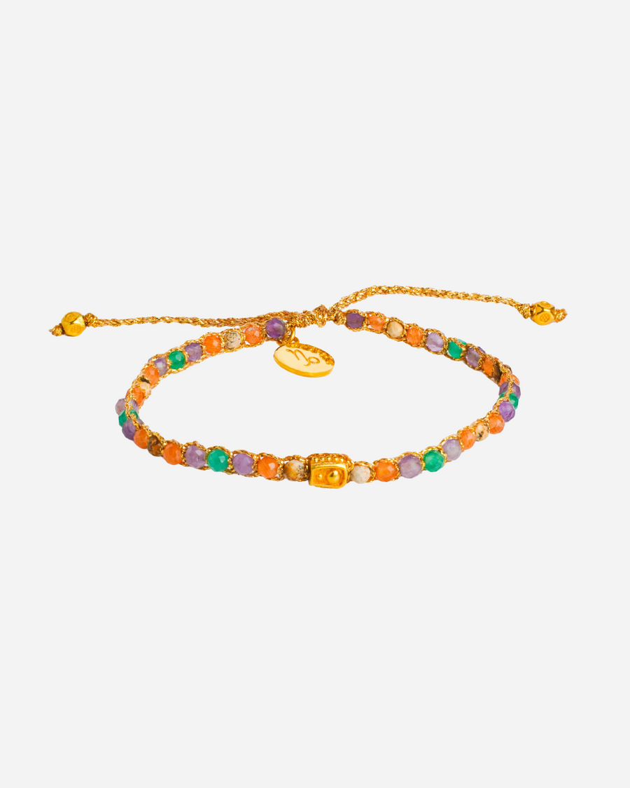 Capricorn Crystal Zodiac Gemstone Bracelet with orange, green, purple and brown gemstones woven in pure silver yarn and plated with 18k gold.