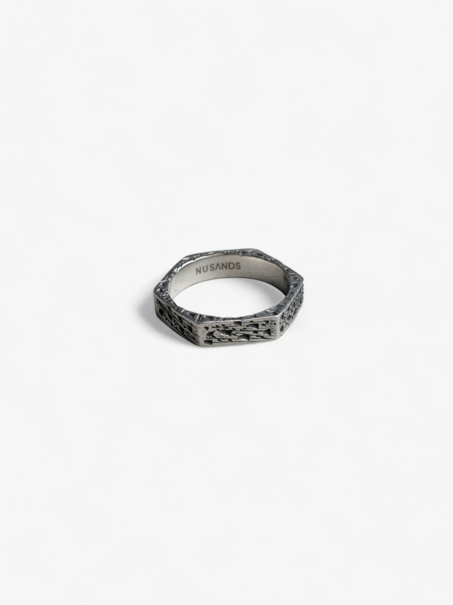 hexagon shaped sterling silver ring laying flat, hammered oxidised finish - nusands six base ring.