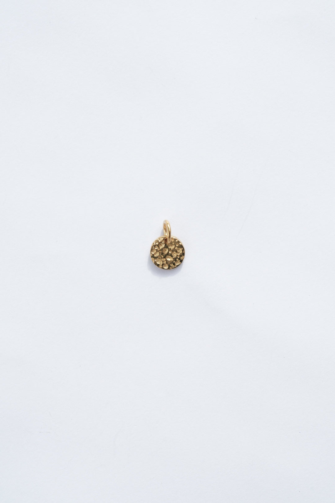 round 18k gold necklace moon charm with hammered texture zoomed out