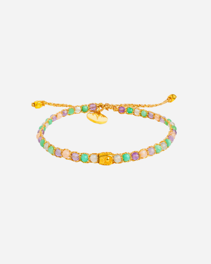 Aries Crystal Zodiac Gemstone Bracelet  with purple, blue aquamarine, light orange, green and clear gemstones woven in pure silver yarn and plated with 18k gold.