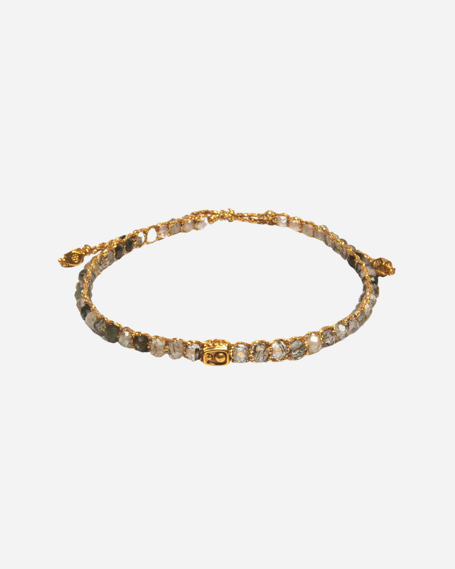 Black Rutilated Quartz Crystal Bracelet with grey, black and clear coloured gemstones woven in pure silver yarn and 18k gold plated.