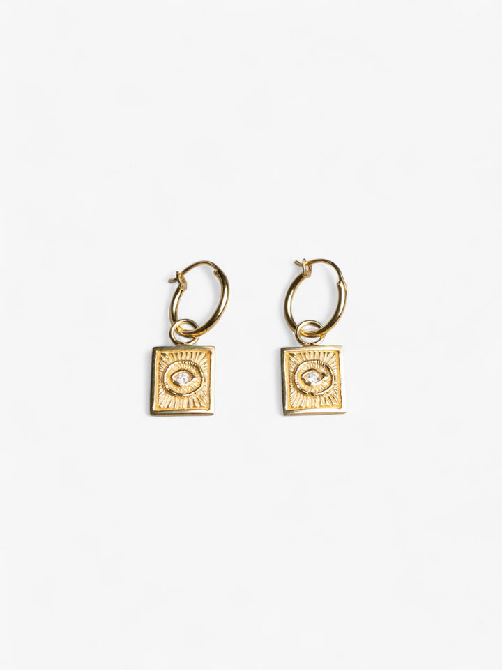 Pair of 18K gold hoop earrings with removable evil eye charms