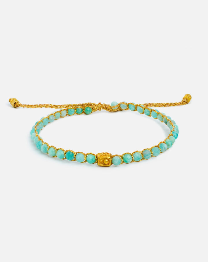 Amazonite Crystal Gemstone Adjustable bracelet strung together with 18K Gold Yarn.