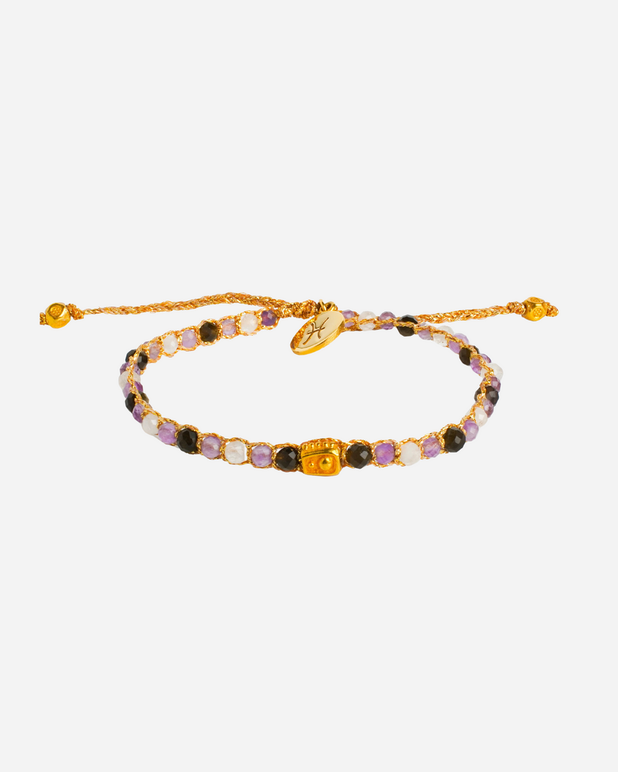 Pisces Crystal Zodiac Gemstone Bracelet with different purple, black and clear moonstone gemstones woven in pure silver yarn and plated with 18k gold.