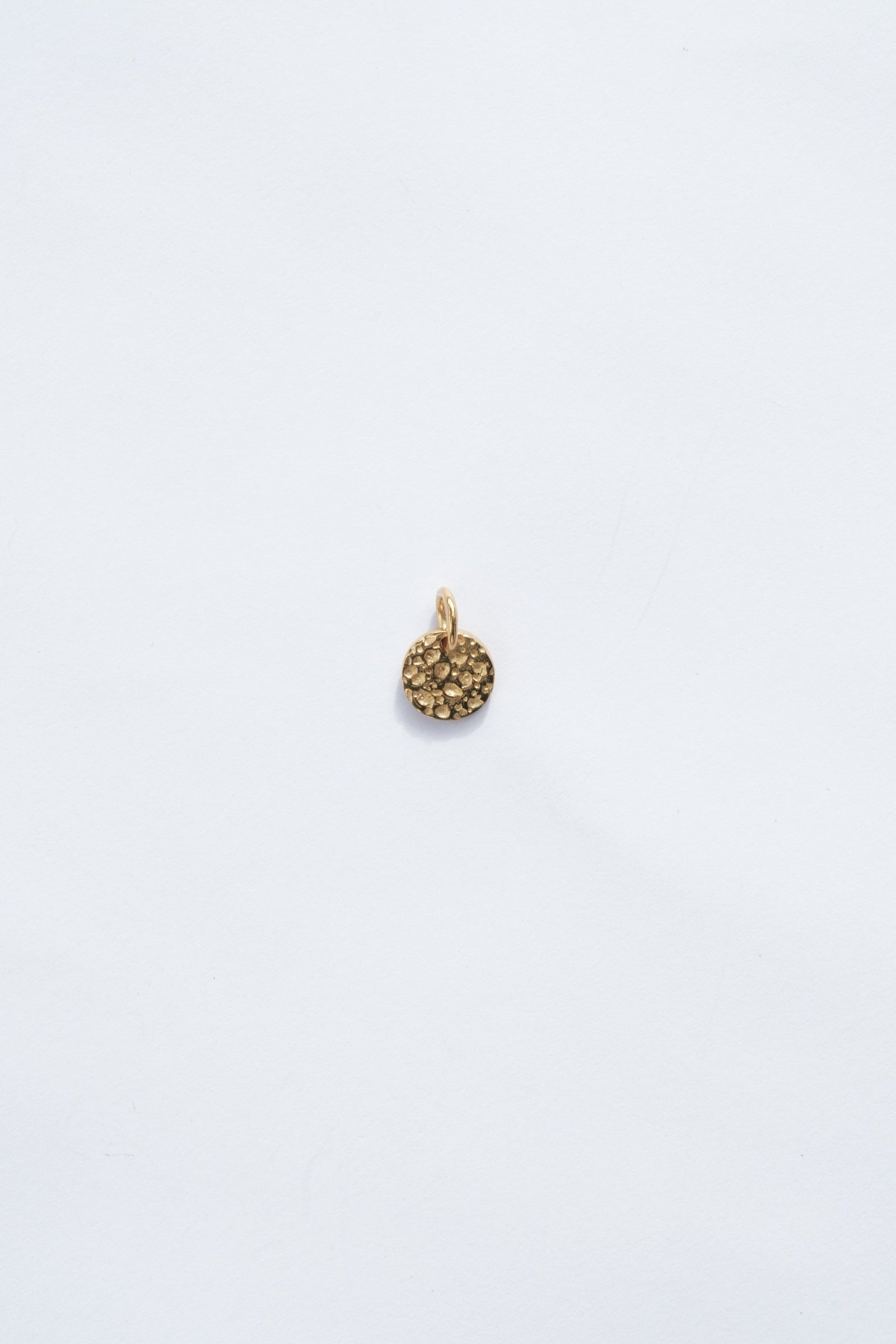 round 18k gold necklace moon charm with hammered texture zoomed out